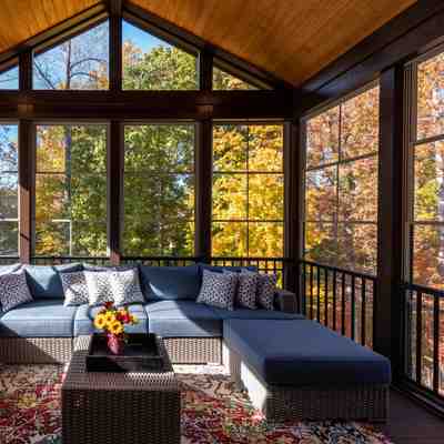 Sunlit spacious sunroom addition enhancing a picturesque new jersey home s charm and value
