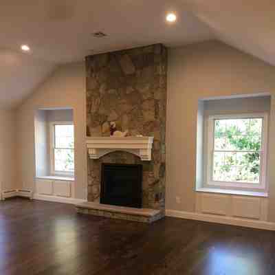 Versatile recreation room with space for entertaining  reflecting On the Spot Home Improvements' expertise in crafting multi functional spaces for New Jersey families