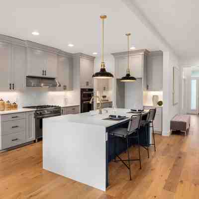 Kitchen remodeling in new jersey featuring a modern white cabinet design