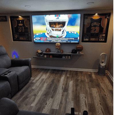 Lightbox Thumbnail Sports-entertainment-center-adorned-with-team-memorabilia-and-a-large-viewing-screen-a-testament-to-creating-personalized-recreation-spaces-for-New-Jersey-sports-enthusiasts