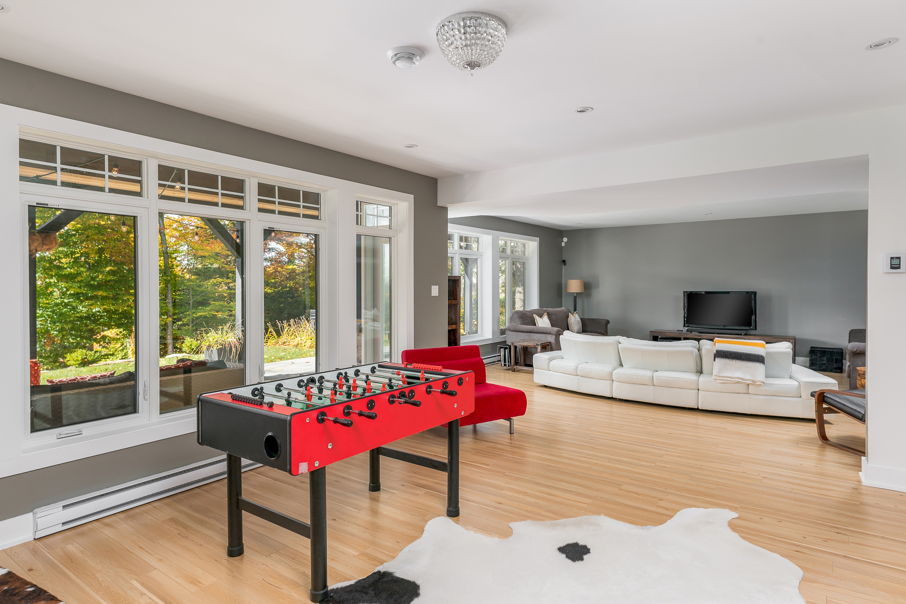 Interactive gaming room remodel emblematic of a contemporary recreation space design in New Jersey